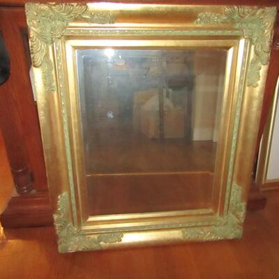 LOT 37  BEVELED WALL MIRROR WITH WOODEN FRAME