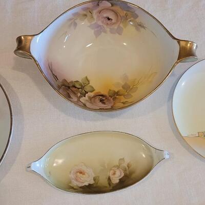 Lot 159: Hand Painted Rose Dishes marked pieces Prussia, Germany, Nippon and Everett