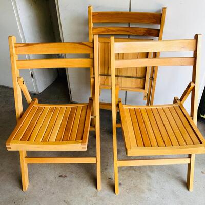 LOT 161  GROUP OF THREE WOODEN SLAT FOLDING CHAIRS