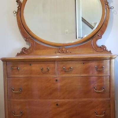 Lot 200: Antique Victorian Tiger Oak Dresser with Mirror and Casters 