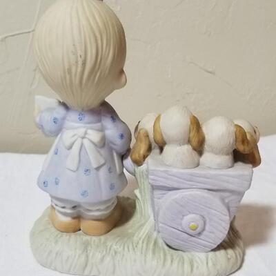 Lot 210: Precious Moments "God Loveth a Cheerful Giver"