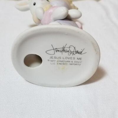 Lot 211: Precious Moments "God Understands" and "Jesus Loves Me"