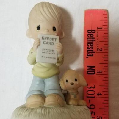 Lot 211: Precious Moments "God Understands" and "Jesus Loves Me"