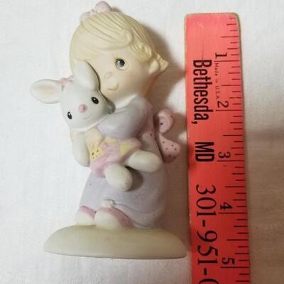 Lot 211: Precious Moments "God Understands" and "Jesus Loves Me"
