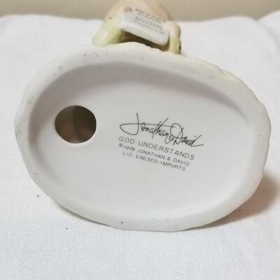 Lot 211: Precious Moments "God Understands" and "Jesus Loves Me"