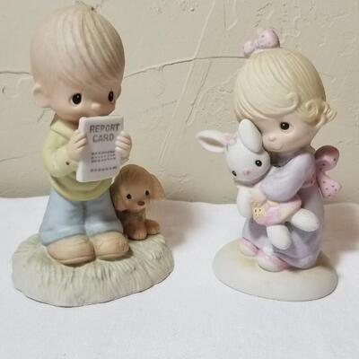 Lot 211: Precious Moments "God Understands" and "Jesus Loves Me"