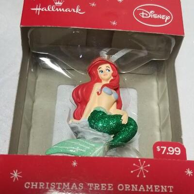 Lot 220: Little Mermaid Christmas Ornament and Snowbabies Ornament 