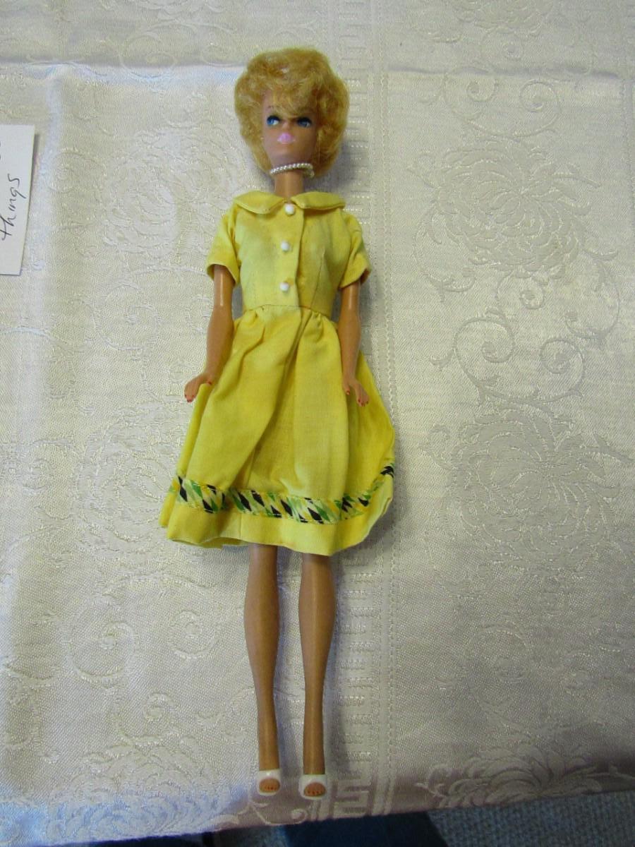 LOT 24 1958 BUBBLE CUT BARBIE DOLL EstateSales