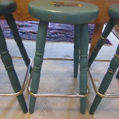 LOT 26 FOUR STOOLS WITH ROSEMALING DESIGN