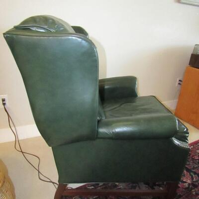 LOT 54 WING BACK GREEN LEATHER RECLINER 