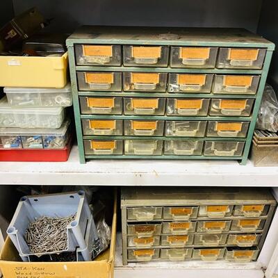 LOT 196  VINTAGE WHITE UTILITY CABINET PACKED WITH NAILS SCREWS BOLTS NUTS FASTENERS 