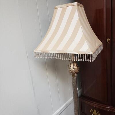 Ornated  gold and black floor lamp