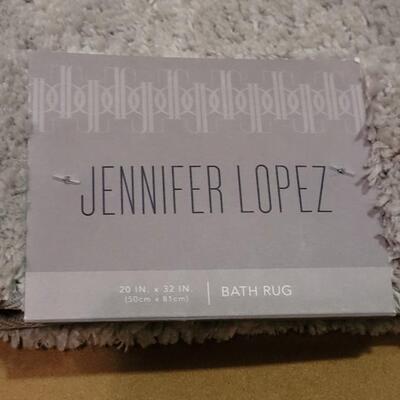 Lot 295: (2) Jennifer Lopez 20" Ã— 32" Light Gray Rugs 