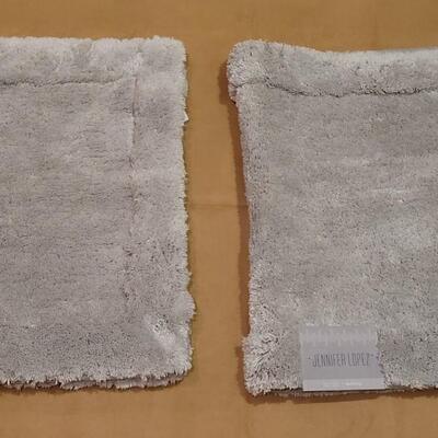 Lot 295: (2) Jennifer Lopez 20" Ã— 32" Light Gray Rugs 