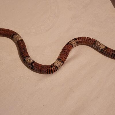 Lot 309: (2) Handpainted Wood Snakes