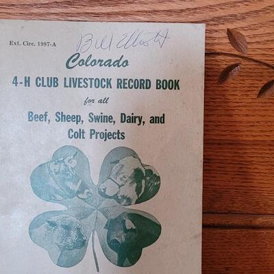 Lot 325: 1944 Weld County 4H Livestock Record Book and Vintage Cow Toy