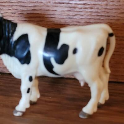 Lot 325: 1944 Weld County 4H Livestock Record Book and Vintage Cow Toy