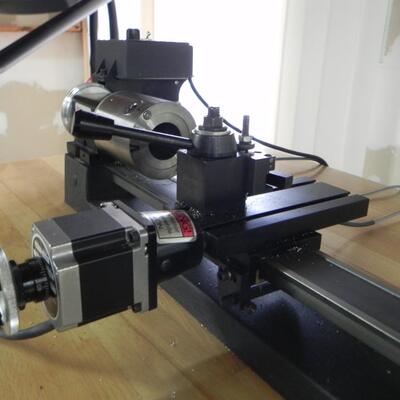 LOT 84 BENCH TOP LATHE AND MIGHTYDRIVE 400