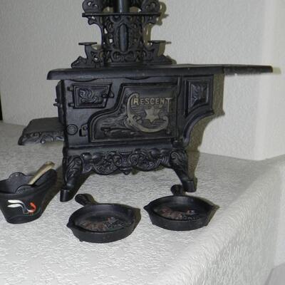 LOT 81  SALESMAN MODEL CASTIRON STOVE