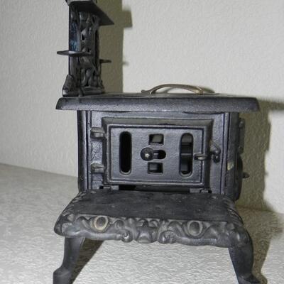 LOT 81  SALESMAN MODEL CASTIRON STOVE