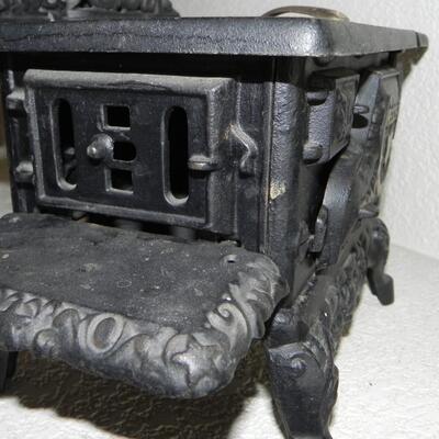 LOT 81  SALESMAN MODEL CASTIRON STOVE