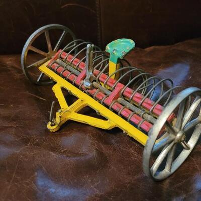 Lot 384: Vintage ARCADE TOYS 7" Cast Iron Farm Tractor Plow Toy w/ Chippy Original Paint 