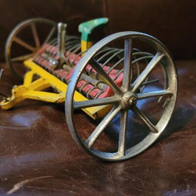 Lot 384: Vintage ARCADE TOYS 7" Cast Iron Farm Tractor Plow Toy w/ Chippy Original Paint 