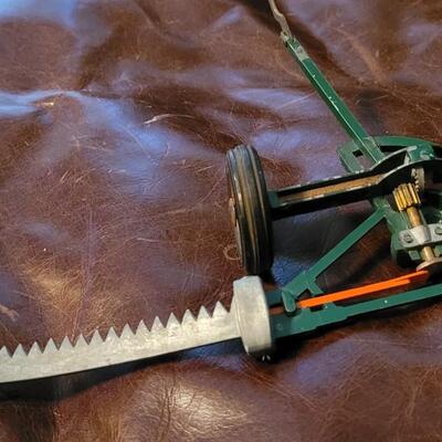 Lot 385: Vintage McCormick Plow + Vintage Metal Cutter 