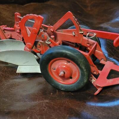 Lot 385: Vintage McCormick Plow + Vintage Metal Cutter 