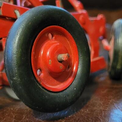 Lot 385: Vintage McCormick Plow + Vintage Metal Cutter 