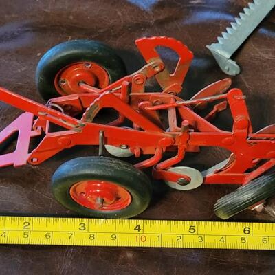 Lot 385: Vintage McCormick Plow + Vintage Metal Cutter 