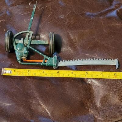 Lot 385: Vintage McCormick Plow + Vintage Metal Cutter 