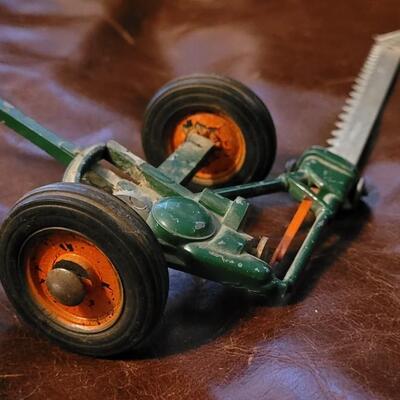 Lot 385: Vintage McCormick Plow + Vintage Metal Cutter 