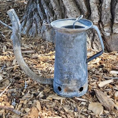 Lot 386: Huffman Half Gallon Liquid Metal Watering Can