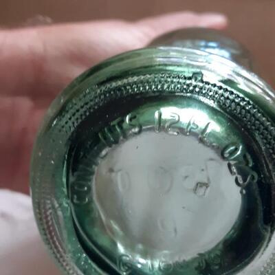 Lot 35 - Tilted Glass Soda Bottle