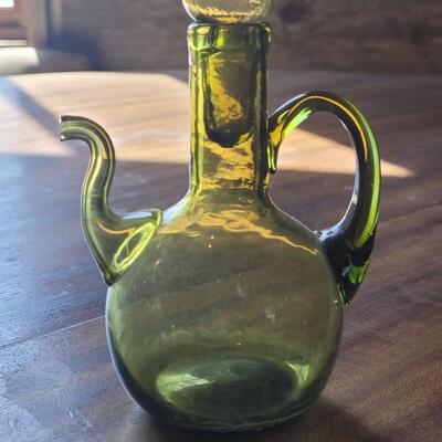 Lot 455: Ceramic Platter, Pewter Frame, Pewter Candleholder and Green Glass Cruet Bottle 