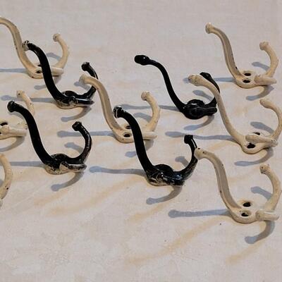 Lot 471: Antique Black & White Triple Hooks 