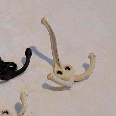 Lot 471: Antique Black & White Triple Hooks 