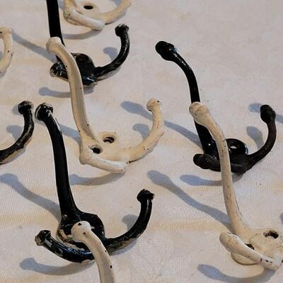 Lot 471: Antique Black & White Triple Hooks 