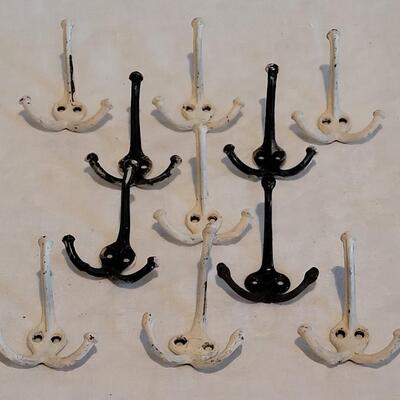Lot 471: Antique Black & White Triple Hooks 