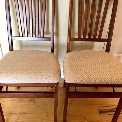 Two Padded Folding Chairs