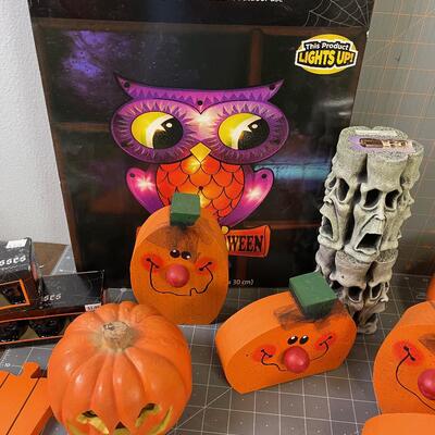 #227 Table full of Halloween, Wood and Resin and candles. 