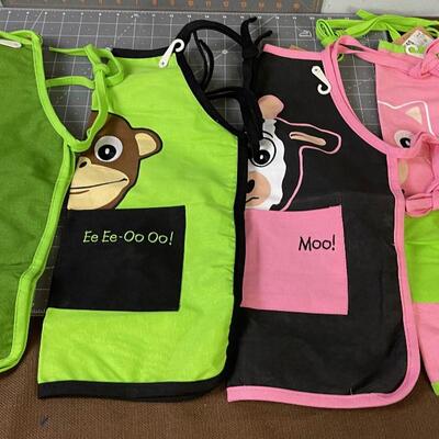 #257   Children's Aprons; Art, Cooking, Painting Etc.