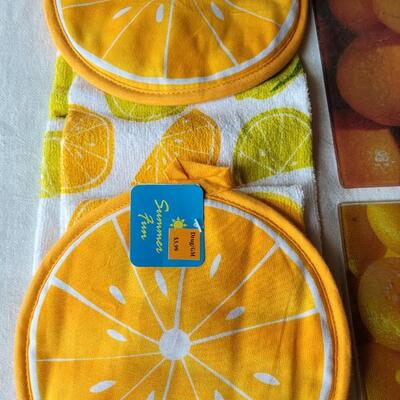 Lot 30: (2) Citrus Glass Cutting Boards & Citrus Pot Holders and Kitchen Towels