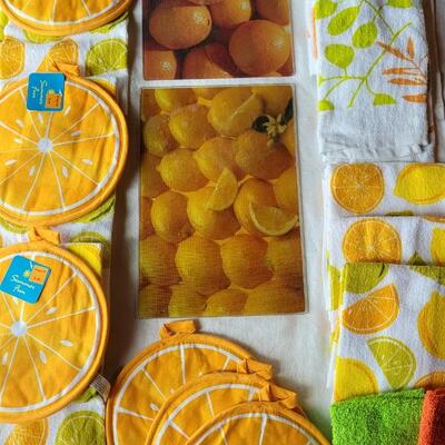 Lot 30: (2) Citrus Glass Cutting Boards & Citrus Pot Holders and Kitchen Towels