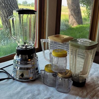 Lot 31: Vintage Oster Silver Blender with 2 extra Pitchers & 3 Jars