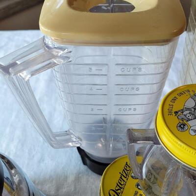 Lot 31: Vintage Oster Silver Blender with 2 extra Pitchers & 3 Jars