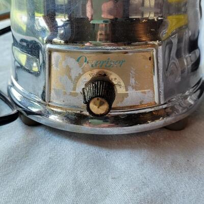 Lot 31: Vintage Oster Silver Blender with 2 extra Pitchers & 3 Jars