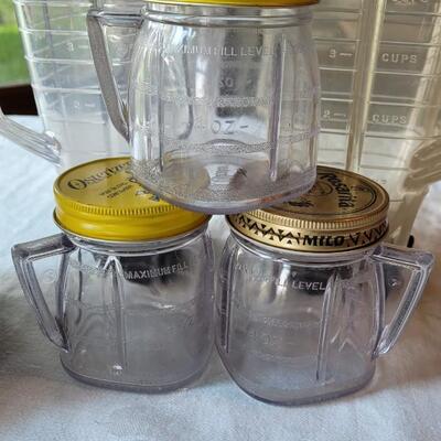 Lot 31: Vintage Oster Silver Blender with 2 extra Pitchers & 3 Jars
