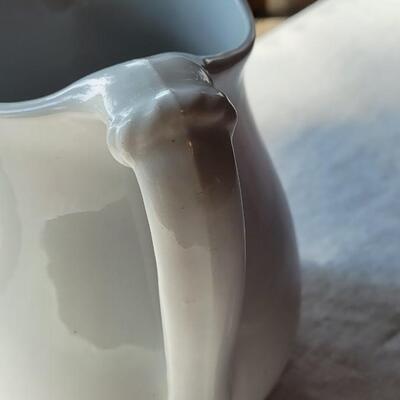 Lot 45: Antique White Dresden Stone & The Potter's Co-op Pitcher made in East Liverpool, Ohio